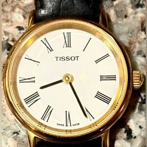 Tissot Classic Gold and Black Watch, T852k